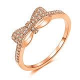 Make sure your fingers are as fashionable as the rest of you with this charming Dainty Bow Ring! This beautiful and delicate accessory is adorned with sparkling CZ stones and features a classic bow shape that is only slightly larger than a whisper. Just one touch and you'll fall in love!