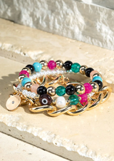 This three-piece bracelet set is a gem! The natural stones, acrylic, glass, metal and pearl combine to create a look of fascination and glamour. With each one measuring 8.25" and a diameter of 2.5", you can rock the world with this stunning set! Nickel/Lead compliant, this jewelry is sure to make a statement.