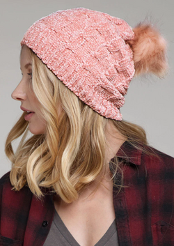 Stay toasty and do it with style in this Blush Pink Chenille Cable Knit Beanie! Enjoy the luxurious softness of chenille knit and keep your ears warm with a faux-fur pom-pom accent. Keep the cold out and your cool in with this winter essential - wooly bliss for your noggin!