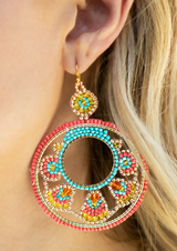 Make a statement with these dazzling Boho Seed Bead Circle Drop Earrings! Show off your unique style with their stunning detailed ethnic design that's sure to impress! Crafted with 50% glass beads and 50% iron metal and Nickel/Lead Compliant, these gorgeous 3" long, 2.25" wide earrings are the perfect pair for any trendsetter!