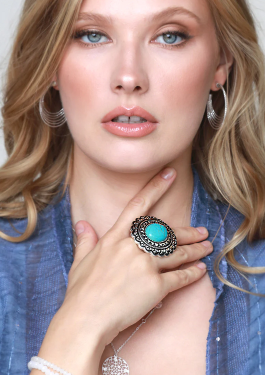 Bring some Bohemian flair and sparkle to your look with this gorgeous mandala flower ring! Featuring a semi-precious stone centerpiece and stretch fit design, this ring looks stunning with all your summer outfits and is sure to turn heads. Shine your brightest with this unique accessory!