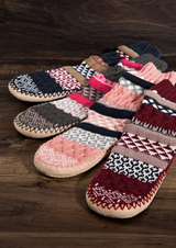 Be the envy of everyone with our Cozy Gray Pink Ankle Slippers! These Nordic-patterned slipper socks will keep your feet nice and toasty and their cushioned non-slip grip sole will keep you safe. Crafted from 100% acrylic sock and 100% polyester sole, you'll be guaranteed a snug fit no matter your size — S/M for shoe size 6-7, L/XL for shoe size 8-10. Slip into luxury!