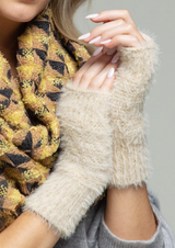 Keep your hands toasty and still have access to all your fingertips with these Soft Fuzzy Beige Fingerless Winter Gloves! Snuggle up to their soft garter stitch pattern and cozy stretch rib band and let your fingers do the walking. Get that winter look without the inconvenience of having to take your gloves off! 50% Nylon, 50% Acrylic. Go grab 'em (but like, with your hands)!