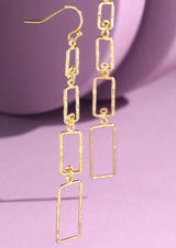 Let your style shine with these delicate dangles! These gorgeous hammered metal layered rectangle dangle earrings add just the right amount of subtle sparkle to your look. Who needs flashy - when you've got dainty? You’re sure to turn heads and drop jaws with these stunners!
