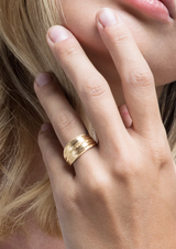 Make a statement with our Boho Layered Brass Textured Satin Ring! This one-of-a-kind accessory is all the rage, with its multi-layered design and brass finish that's sure to turn heads and get people talkin'. Show off your unique style and make a splash with this adjustable stunner that's sure to become your signature look!