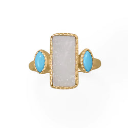 This druzy ring is a dream! 14 karat gold plated sterling silver ring features striking druzy and synthetic turquoise. Druzy measures 14.3mm x 7.3mm and turquoise is 5.9mm x 3.2mm. Band is 2mm wide. Available in whole sizes 6-9.  .925 Sterling Silver 